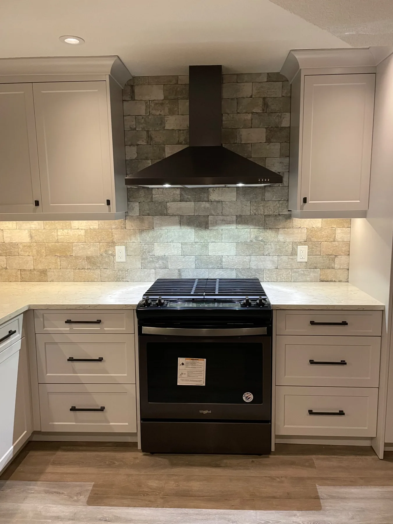 Custom kitchen range wall and cabinetry