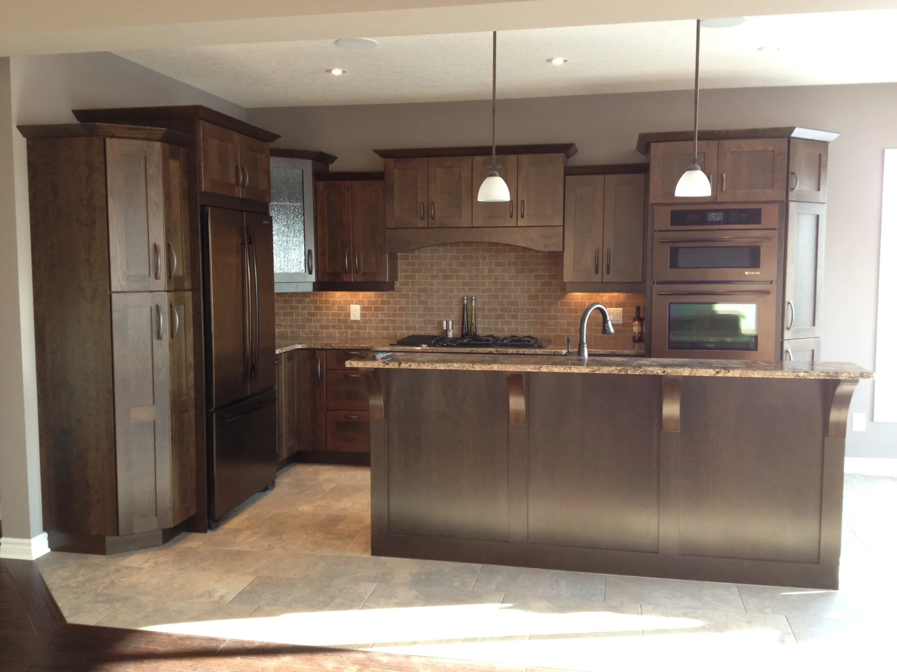 Traditional wood kitchen with large island